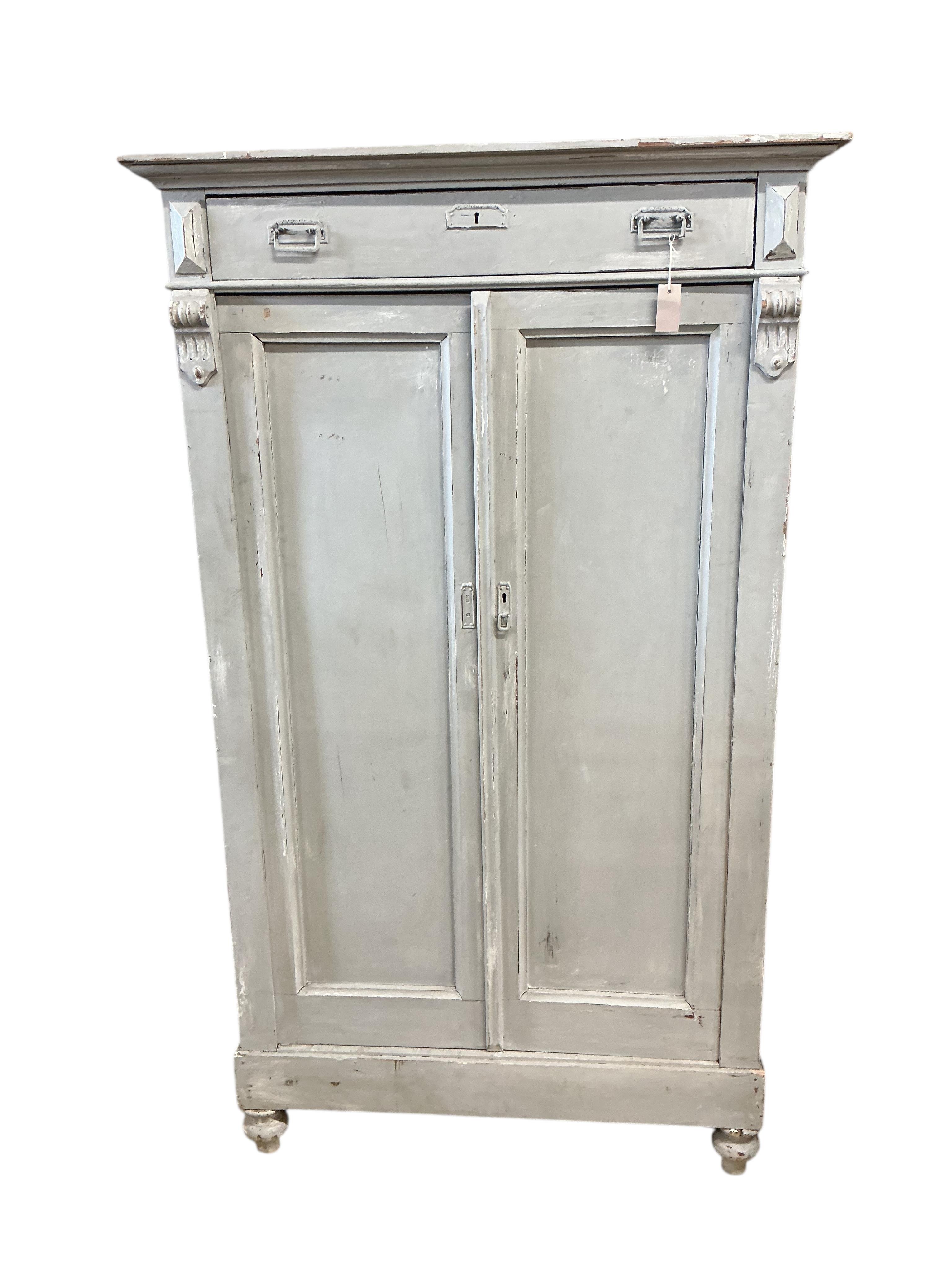A 19th century Continental painted pine press cupboard, width 110cm, depth 40cm, height 186cm
